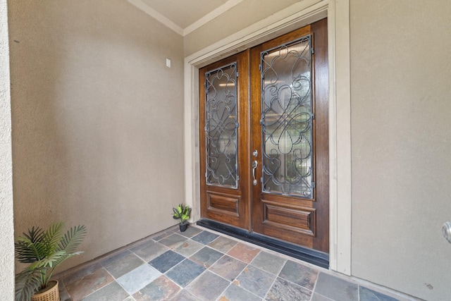 17803 Netherby Ln, Richmond, TX 77407 - view of exterior entry featuring french doors and stucco siding