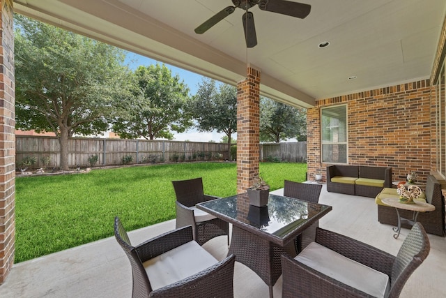 17803 Netherby Ln, Richmond, TX 77407 - fenced backyard with an outdoor hangout area, a ceiling fan, a patio, and outdoor dining space