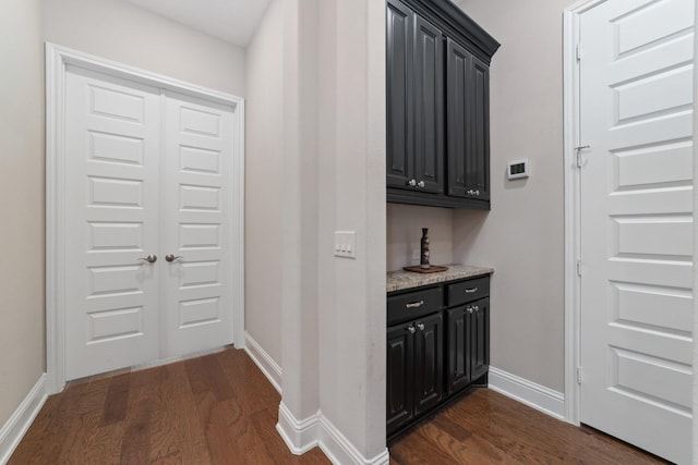 17803 Netherby Ln, Richmond, TX 77407 - hall featuring dark wood-style floors and baseboards