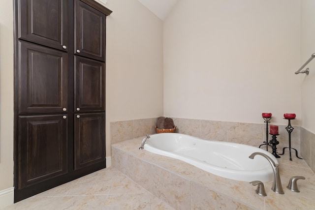 17803 Netherby Ln, Richmond, TX 77407 - bathroom featuring a bath and lofted ceiling