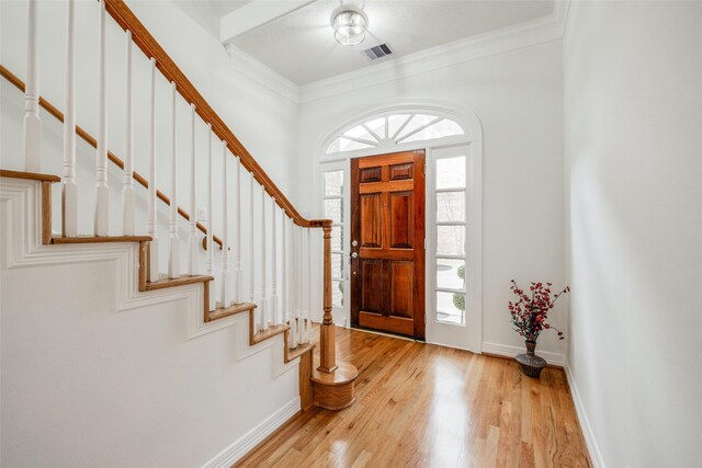 2827 Briarhurst Park, Houston, TX 77057 - entrance foyer with light wood finished floors, plenty of natural light, visible vents, and stairway