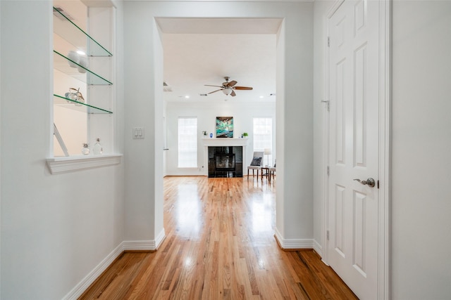 2827 Briarhurst Park, Houston, TX 77057 - corridor featuring light wood-style flooring and baseboards