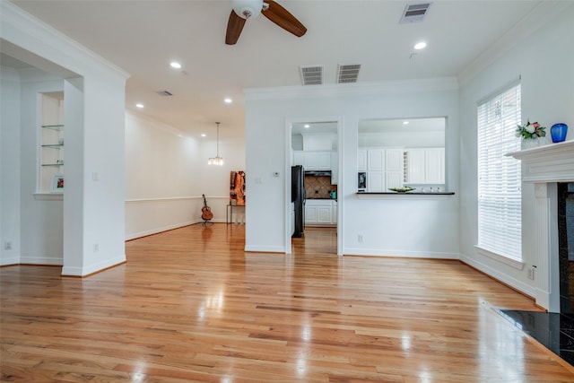 2827 Briarhurst Park, Houston, TX 77057 - unfurnished living room featuring ceiling fan, a fireplace, and visible vents