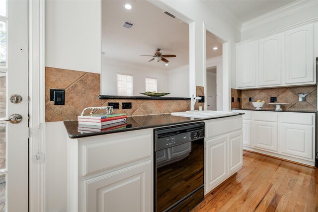 2827 Briarhurst Park, Houston, TX 77057 - kitchen with dishwasher, ornamental molding, ceiling fan, visible vents, and a sink