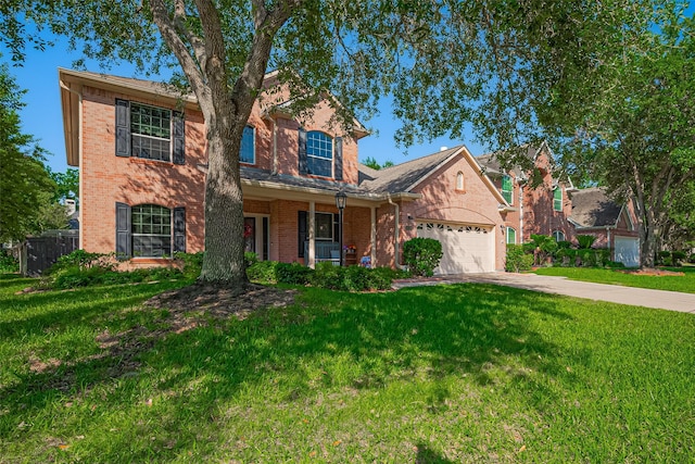 traditional-style home with brick siding, concrete driveway, and a garage