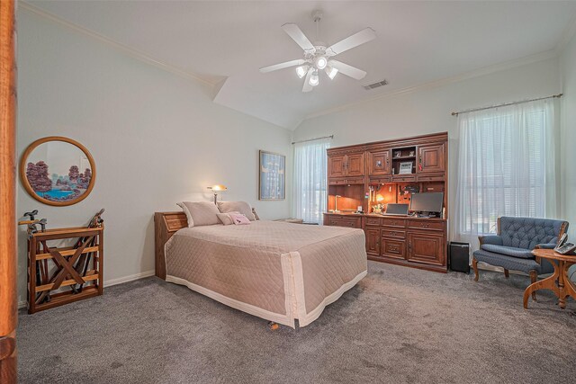 carpeted bedroom with ornamental molding, a ceiling fan, lofted ceiling, and baseboards