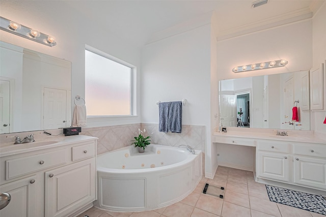 full bathroom with tile patterned floors, a whirlpool tub, and two vanities