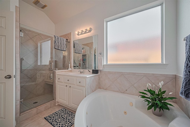full bath featuring a jetted tub, a shower stall, healthy amount of natural light, and vanity