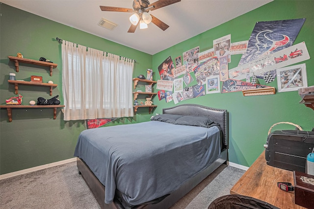 bedroom with carpet, baseboards, and ceiling fan