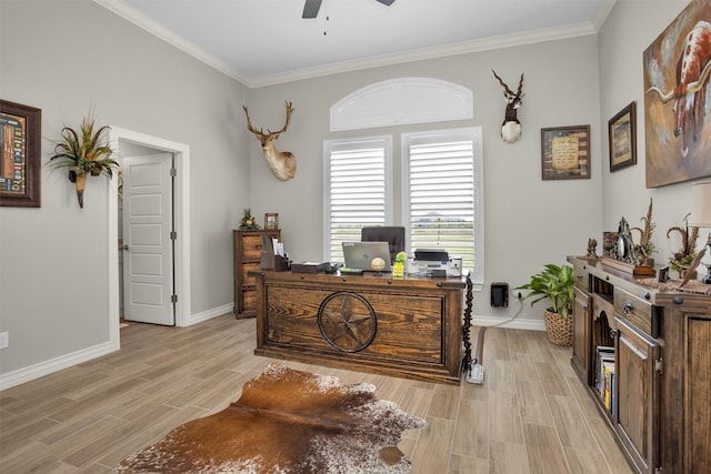 office space featuring ornamental molding, light wood-type flooring, baseboards, and ceiling fan