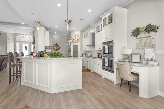 kitchen featuring recessed lighting, glass insert cabinets, stainless steel double oven, a peninsula, and decorative backsplash