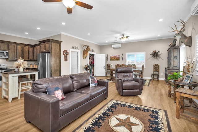 living room featuring a ceiling fan, a wall mounted air conditioner, and recessed lighting