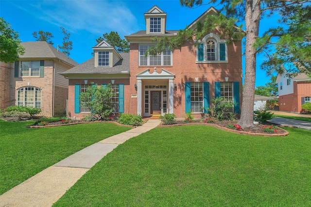 14906 Stonemeade Pl, Cypress, TX 77429 - view of front of property featuring a shingled roof, brick siding, and a front yard