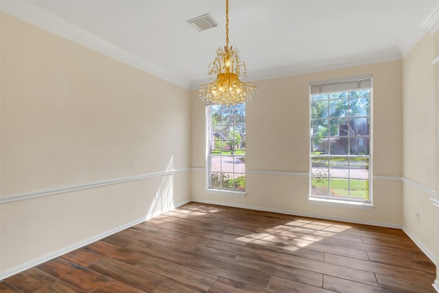 14906 Stonemeade Pl, Cypress, TX 77429 - unfurnished dining area featuring plenty of natural light, wood finished floors, ornamental molding, and a notable chandelier