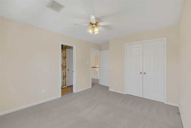 14906 Stonemeade Pl, Cypress, TX 77429 - unfurnished bedroom featuring a ceiling fan, a closet, visible vents, baseboards, and light carpet