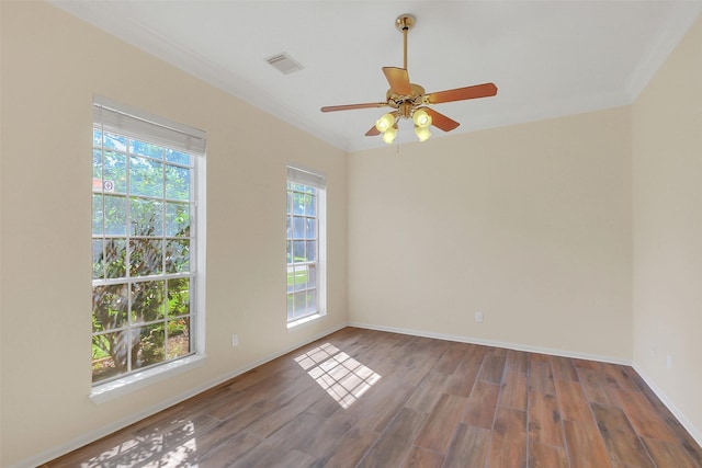 14906 Stonemeade Pl, Cypress, TX 77429 - unfurnished room featuring a ceiling fan, ornamental molding, visible vents, and wood finished floors