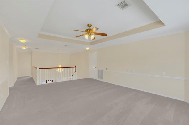 14906 Stonemeade Pl, Cypress, TX 77429 - unfurnished room with visible vents, a raised ceiling, and carpet floors