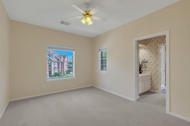 14906 Stonemeade Pl, Cypress, TX 77429 - unfurnished room with light carpet, baseboards, and visible vents