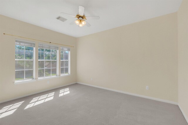 14906 Stonemeade Pl, Cypress, TX 77429 - carpeted empty room featuring ceiling fan, baseboards, and visible vents