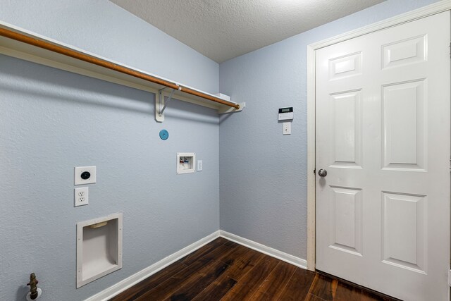 laundry room featuring dark wood-style flooring, hookup for a washing machine, baseboards, electric dryer hookup, and a textured ceiling