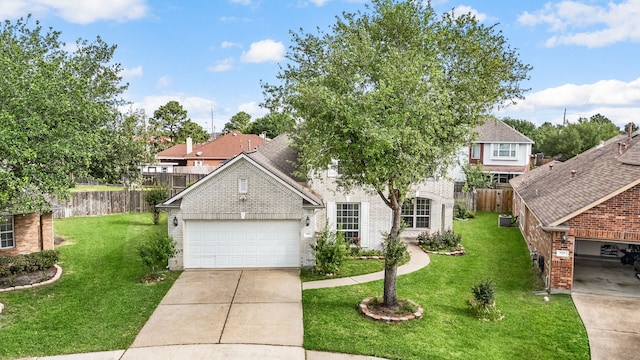 traditional-style home featuring brick siding, a garage, and driveway