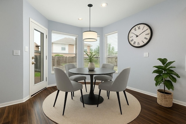 dining space featuring baseboards, recessed lighting, and dark wood-type flooring