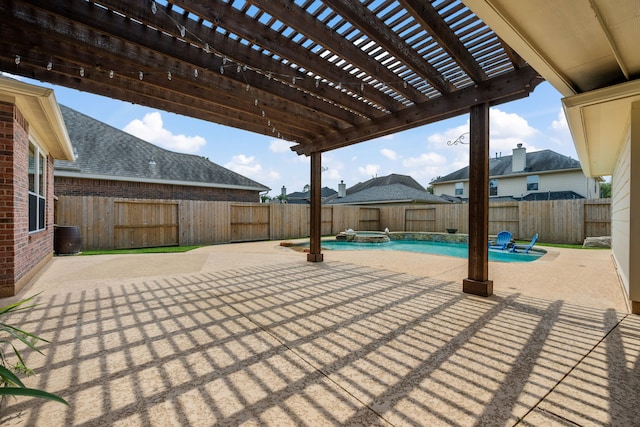 view of patio featuring a fenced backyard, a pool with connected hot tub, and a pergola