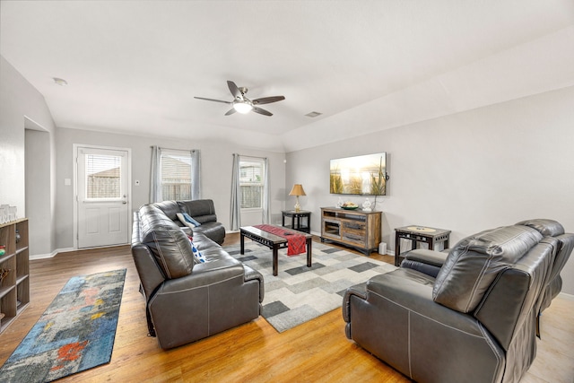 29014 Jacobs River Dr, Katy, TX 77494 - living room with ceiling fan, light wood-style floors, lofted ceiling, and baseboards