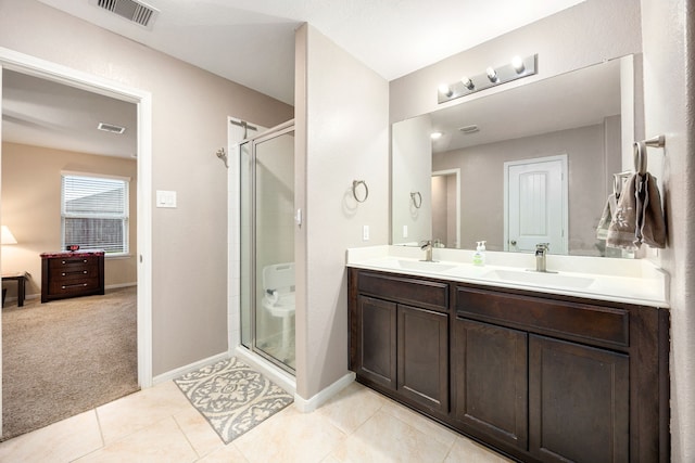 29014 Jacobs River Dr, Katy, TX 77494 - full bath with a shower stall, double vanity, baseboards, and tile patterned flooring