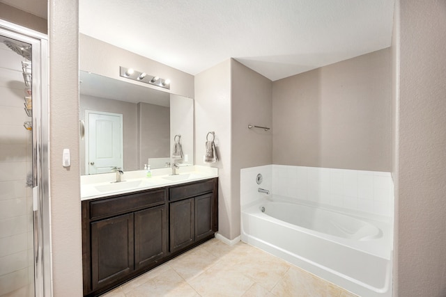29014 Jacobs River Dr, Katy, TX 77494 - full bath with tile patterned flooring, a garden tub, double vanity, and a shower stall
