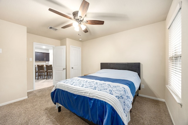 29014 Jacobs River Dr, Katy, TX 77494 - carpeted bedroom with baseboards and ceiling fan