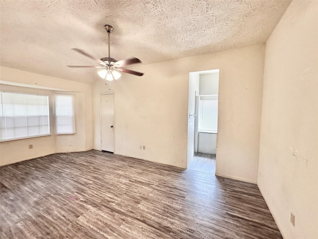 4230 E Terrace Creek Cir, Houston, TX 77014 - empty room with a textured ceiling, a ceiling fan, and wood finished floors