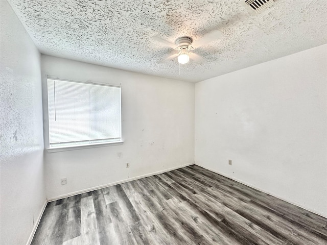 4230 E Terrace Creek Cir, Houston, TX 77014 - empty room with a ceiling fan, visible vents, a textured ceiling, and wood finished floors