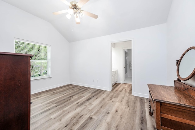 1910 Stormcroft Cir, Katy, TX 77450 - unfurnished bedroom with vaulted ceiling, light wood-type flooring, baseboards, and ceiling fan