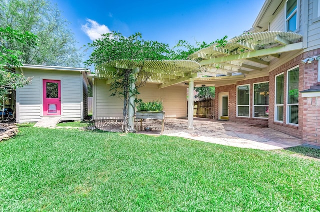1910 Stormcroft Cir, Katy, TX 77450 - rear view of house featuring a pergola, a lawn, a patio, and brick siding