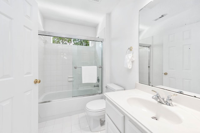 1910 Stormcroft Cir, Katy, TX 77450 - bathroom with toilet, vanity, combined bath / shower with glass door, and tile patterned floors