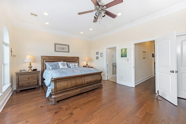 bedroom featuring wood finished floors, visible vents, baseboards, ornamental molding, and recessed lighting