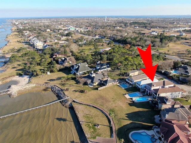aerial view with a water view and a residential view