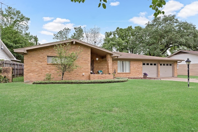 ranch-style house with concrete driveway, a front yard, brick siding, and an attached garage