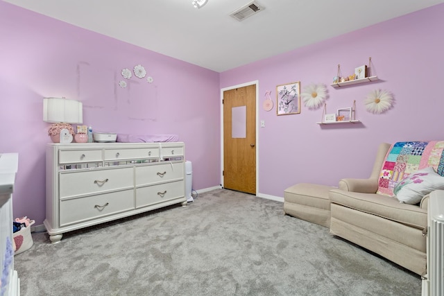 living area featuring carpet, baseboards, and visible vents
