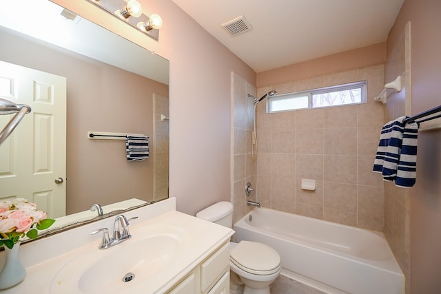 full bathroom featuring toilet,  shower combination, vanity, and visible vents