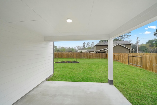 view of yard featuring a fenced backyard and a patio