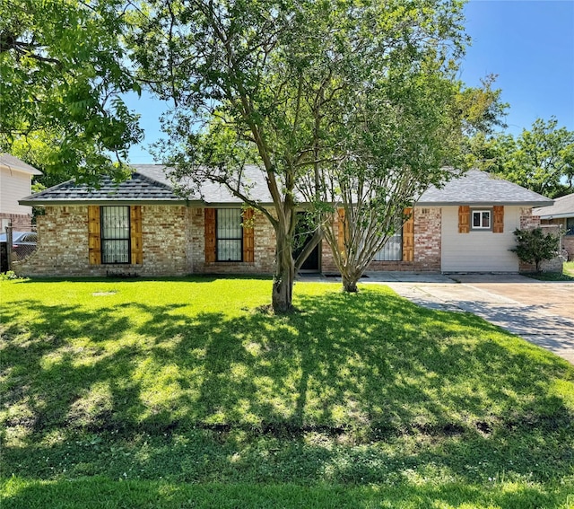 11615 Harrow St, Houston, TX 77093 - view of front of house featuring a front lawn and brick siding