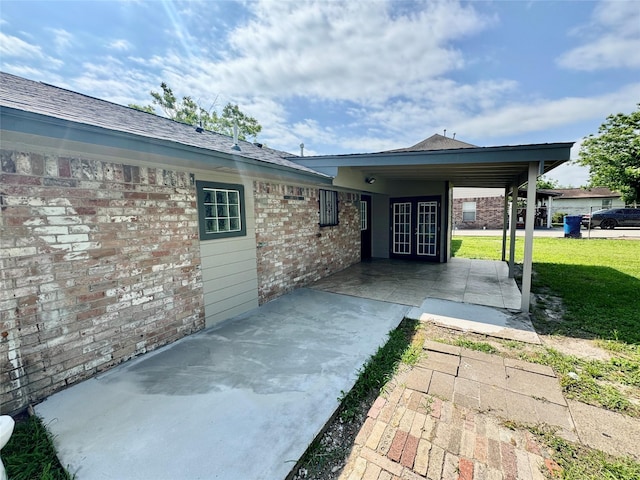 11615 Harrow St, Houston, TX 77093 - view of patio / terrace with french doors