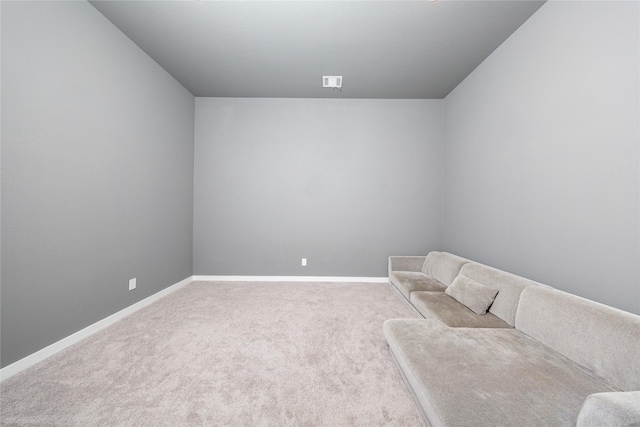 unfurnished room featuring carpet, baseboards, and visible vents