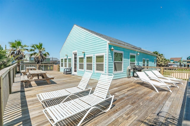 13022 Coronado Dr, Freeport, TX 77541 - wooden deck featuring area for grilling