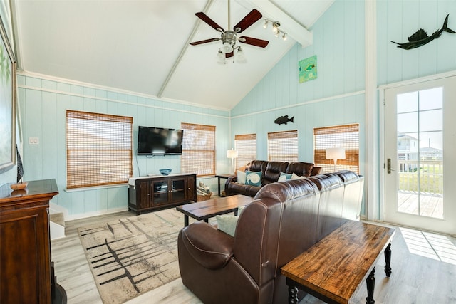 13022 Coronado Dr, Freeport, TX 77541 - living room featuring a wealth of natural light, lofted ceiling with beams, and wood finished floors