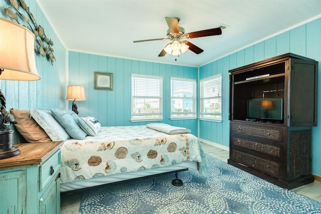 13022 Coronado Dr, Freeport, TX 77541 - bedroom featuring crown molding, visible vents, wood finished floors, and a ceiling fan