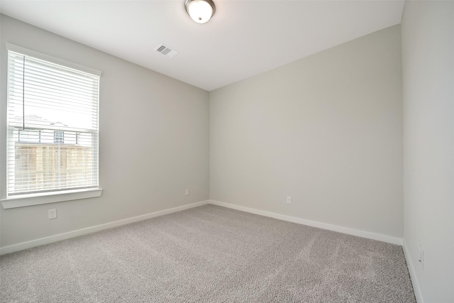 2563 Newport Breeze Dr, Katy, TX 77493 - carpeted empty room featuring baseboards