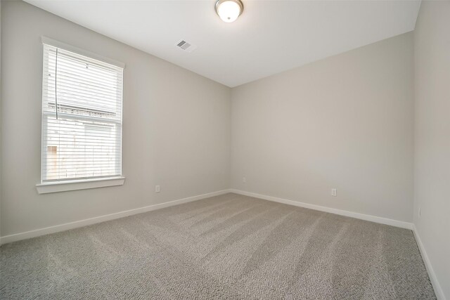 2563 Newport Breeze Dr, Katy, TX 77493 - carpeted empty room featuring baseboards